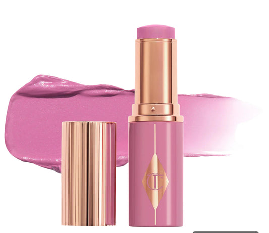 Charlotte Tilbury 
Unreal Lip + Cheek Glow Blush Stick with Hyaluronic Acid